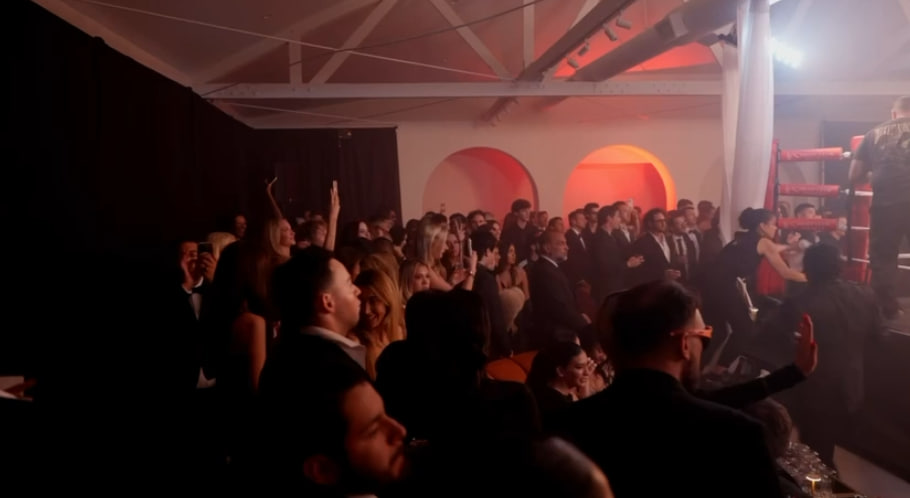 Black-tie crowd ringside